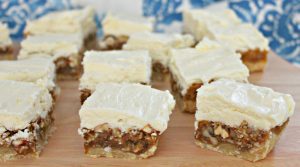 Pecan-Coconut Bars With White Chocolate Cream Cheese Frosting