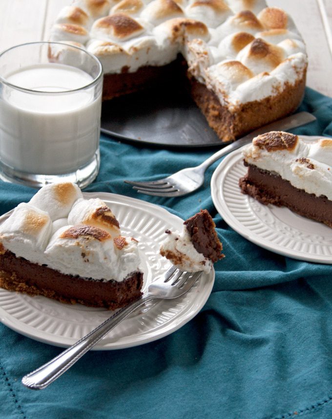 This decadent dessert starts with a graham cracker crust, is filled with a super chocolatey, ultra creamy middle and is finished with toasted marshmallows to make your favorite childhood treat into an elegant and delicious pie.