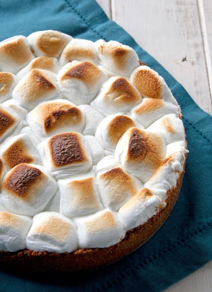 This decadent dessert starts with a graham cracker crust, is filled with a super chocolatey, ultra creamy middle and is finished with toasted marshmallows to make your favorite childhood treat into an elegant and delicious pie.