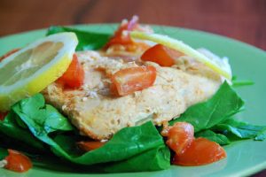 Baked Salmon With Lemon, Spinach And Tomatoes