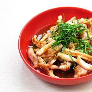 Stir Fried Squid In Thai Red Curry Paste With Fresh Kaffir Lime Leaves